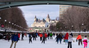 People skate on the ice along the Rideau Canal Skateway