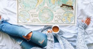 a girl plans a vacation around the world