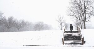 a person walking in the snow in new jersey