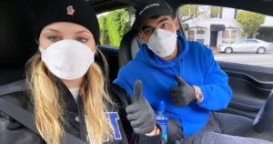 Sophie Turner and Joe Jonas wearing face masks and gloves to protect against COVID-19